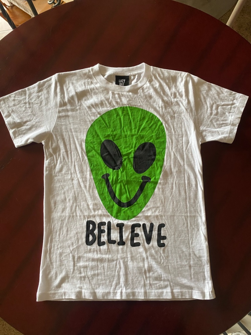 Lazy Oaf White Tee with Green Alien Smile Graphic